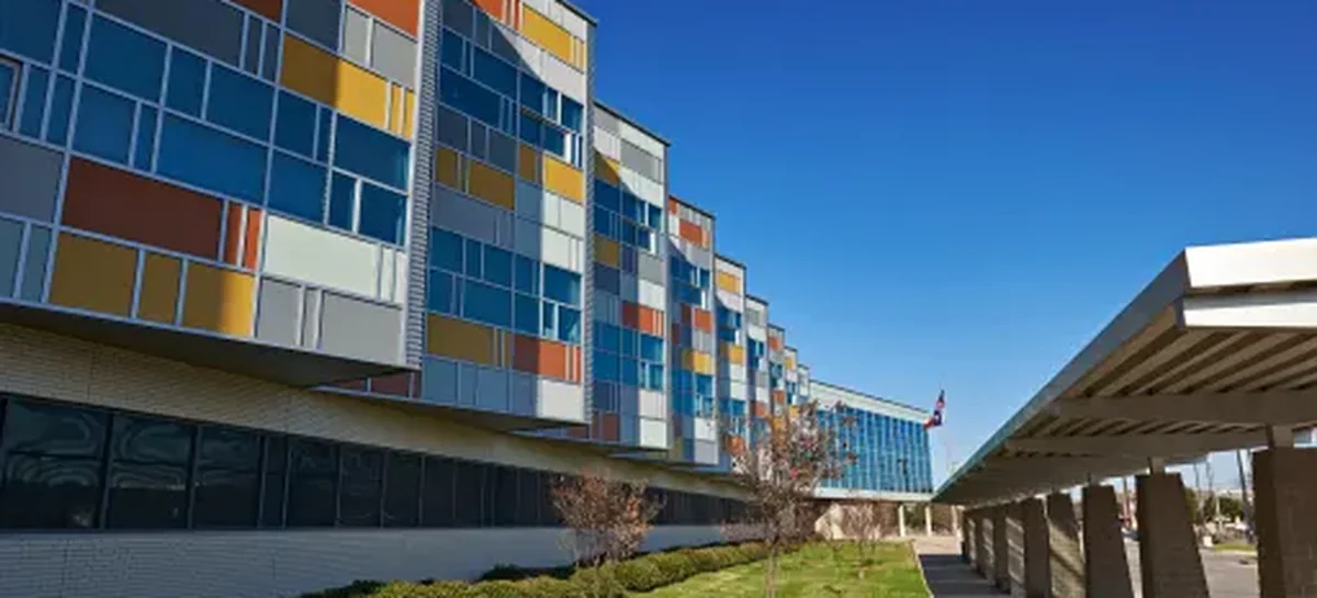 The colored panels along the elevation of T.W. Browne Middle School.