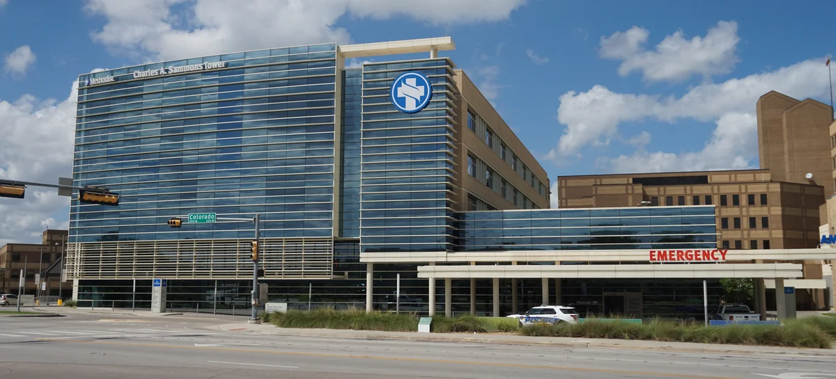 The glass tower and emergency entrance at Methodist Dallas Medical Center.