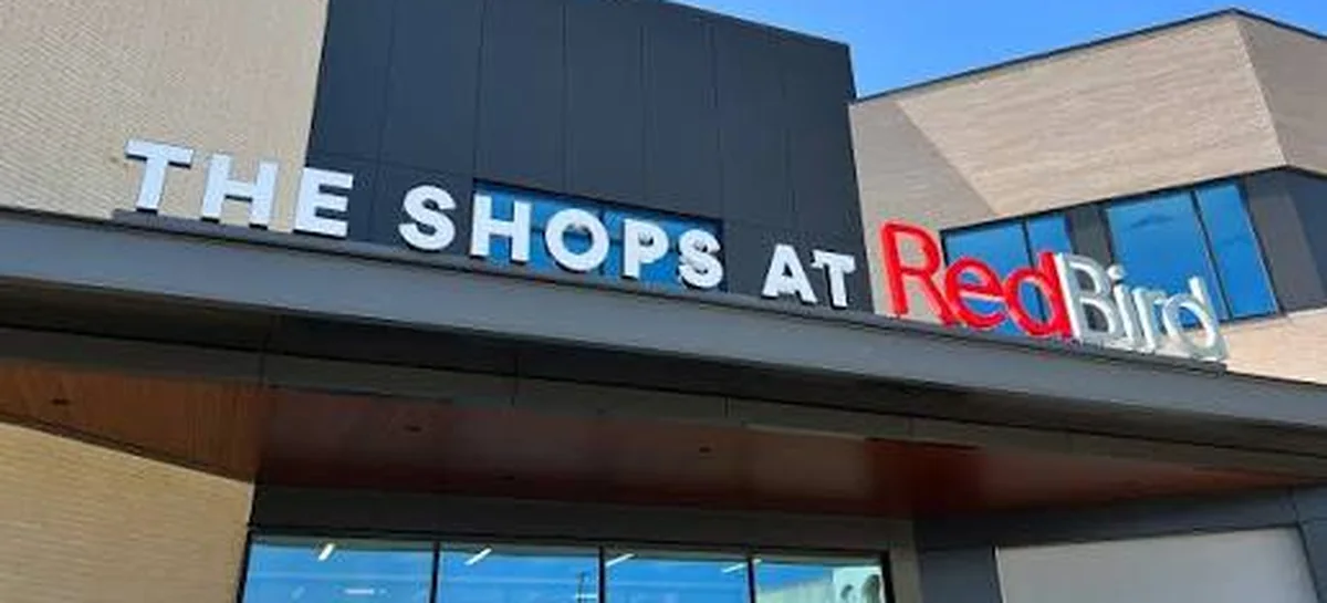 The Shops at RedBird sign above the entrance.